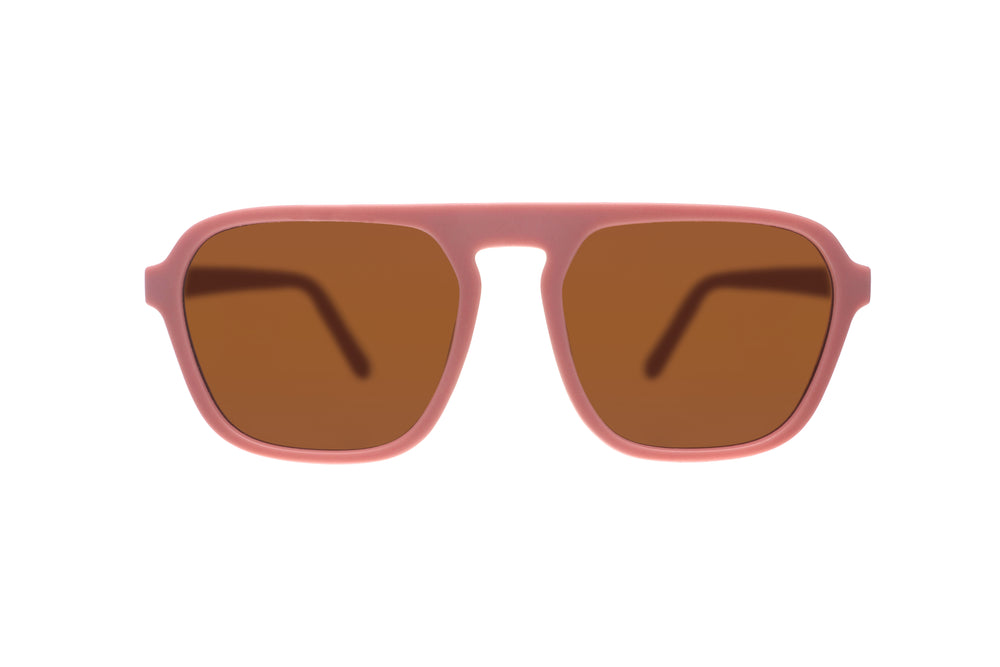 Goodr Retro G sunglasses Threaten Me With a Good Time featuring light pink vintage-inspired square aviator frames with brown non-reflective lenses, designed to stay secure without slipping or bouncing