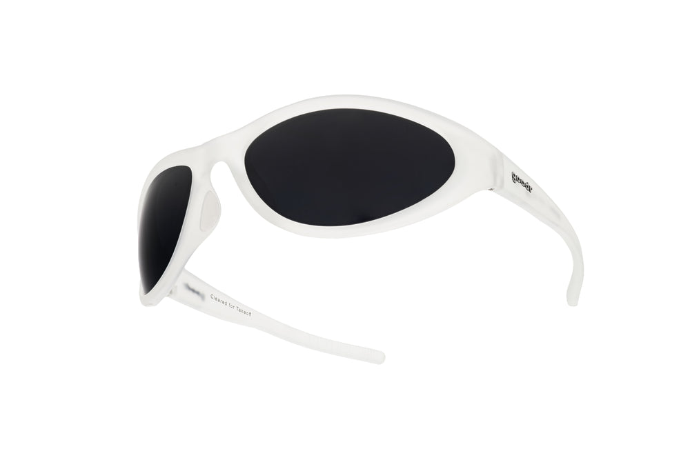 Side view of goodr BugG Cleared for Takeoff sunglasses featuring a transparent wraparound frame with black oval lenses, no-slip grip, and no-bounce performance fit.