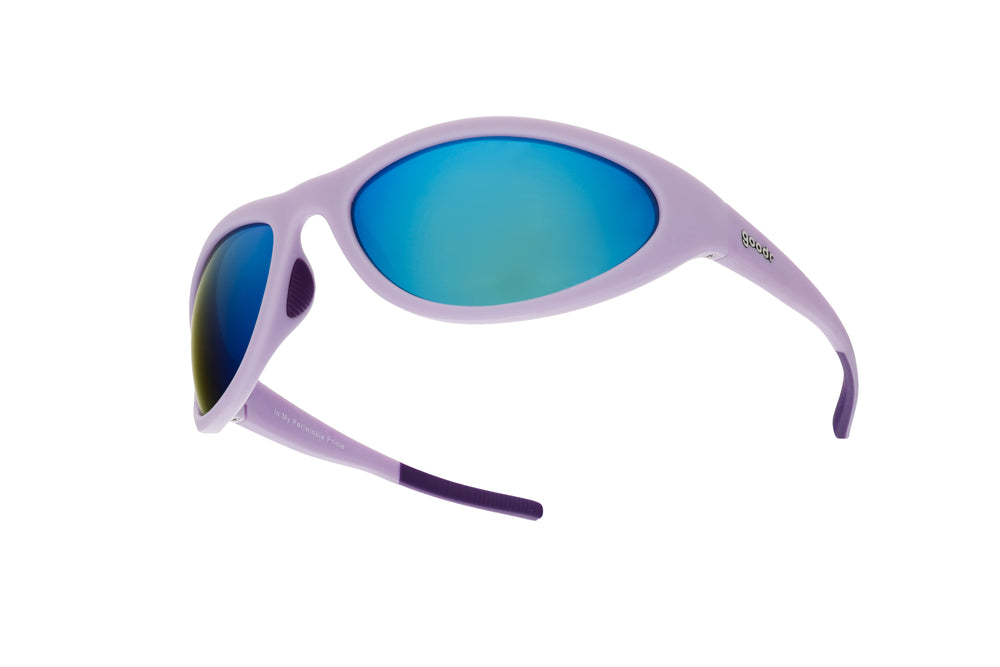 Side view of goodr BugG sunglasses in In My Periwinkle Prime — sleek wraparound frame in pastel purple with mirrored blue lenses.