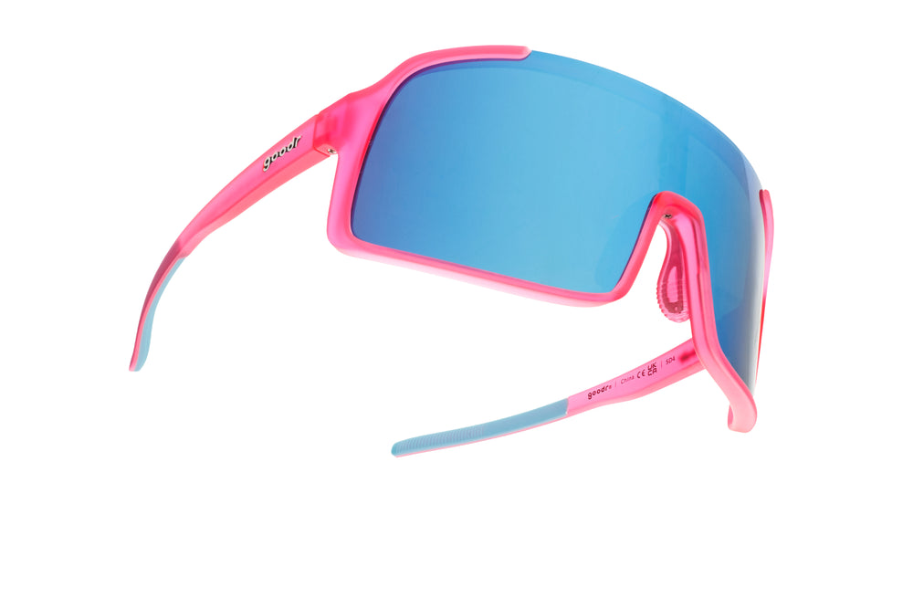 Goodr Shield Astro G sunglasses in Ready the Confetti Canon style with pink frame and blue gradient lenses, perfect for sporty and stylish outdoor wear.