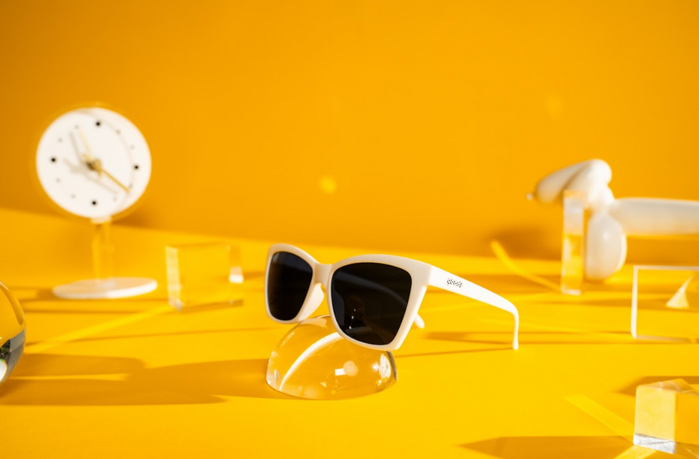 Goodr Pop G sunglasses The Mod One Out featuring white angular frames with black non-reflective lenses, perfect for sporty and trendy outdoor wear