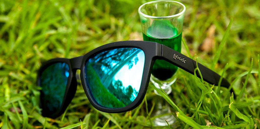 Goodr Vincent's Absinthe Night Terrors OG running sunglasses with black frame and green polarized UV400 lenses — no-slip, no-bounce design for running and active lifestyles.
