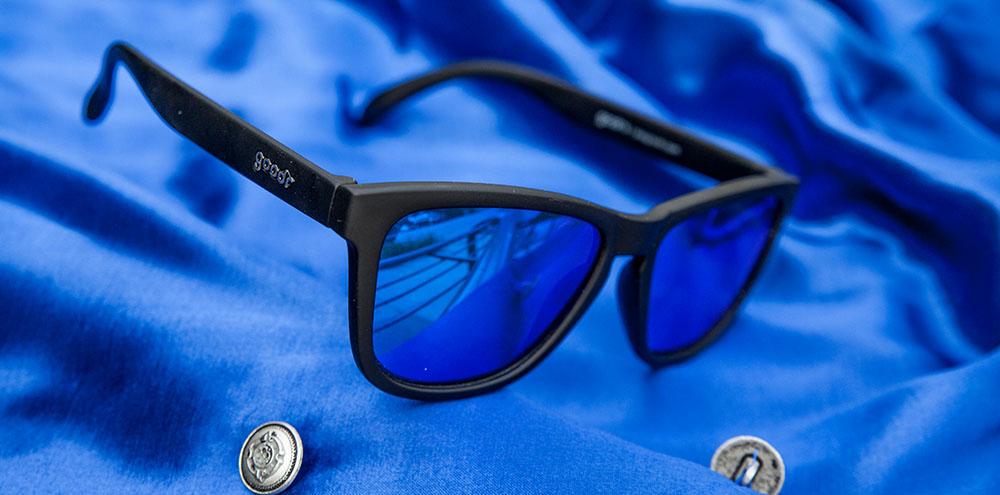 Goodr Mick and Keith's Midnight Ramble OG running sunglasses with black frame and blue polarized UV400 lenses — no-slip, no-bounce design for running, cycling, and active lifestyles.