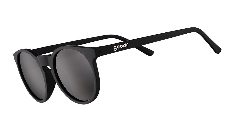 Goodr Circle G "It's Not Black, It's Obsidian" — round black running sunglasses with a sleek obsidian black frame and polarized lenses. Designed for a no-slip, no-bounce fit, perfect for runners seeking style and reliable performance.