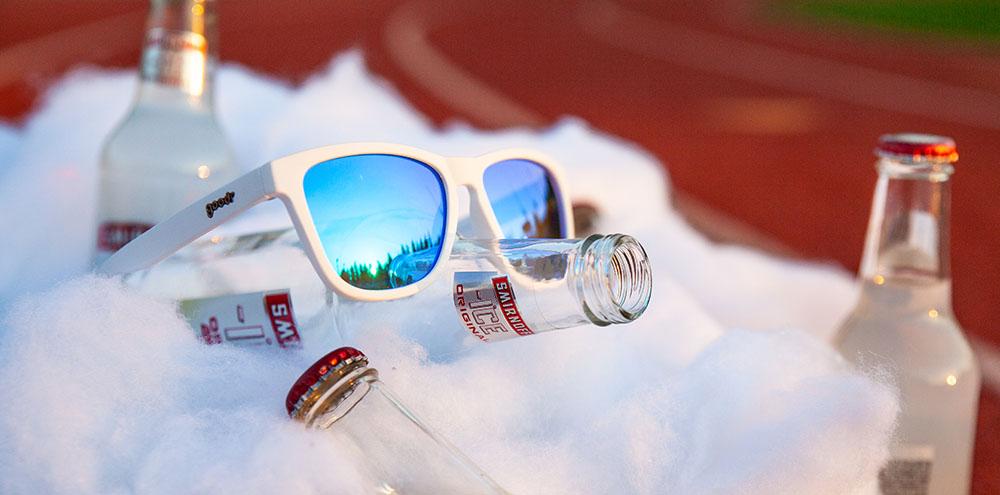 Goodr Iced by Yetis OG running sunglasses with white frame and blue polarized UV400 lenses — no-slip, no-bounce fit ideal for running, cycling, and active lifestyles.