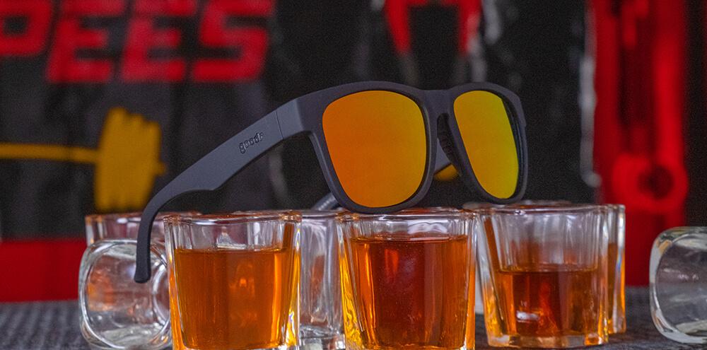 BFG running sunglasses Beelzebub’s Bourbon Burpees model with black frame and amber polarized lenses, no slip no bounce fit designed for bigger heads and comfortable outdoor running.