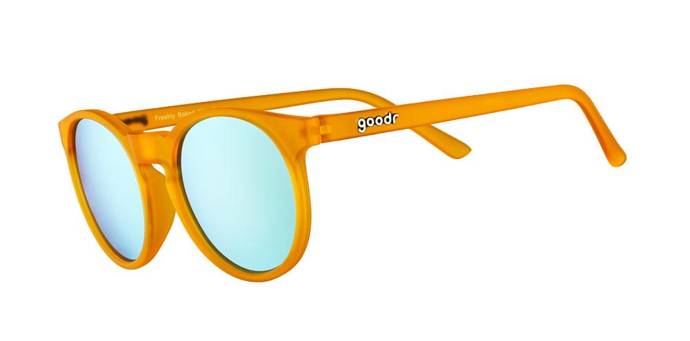 Circle G running sunglasses Freshly Baked Man Buns model with orange frame and blue round polarized lenses, offering no slip no bounce fit for optimal comfort during sports