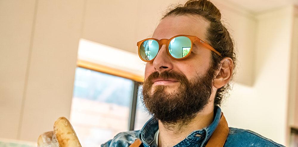 Circle G running sunglasses Freshly Baked Man Buns model with orange frame and blue round polarized lenses, offering no slip no bounce fit for optimal comfort during sports