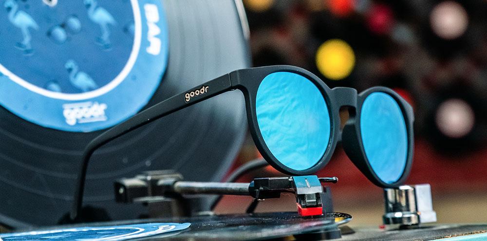 Circle G running sunglasses Midnight Ramble at a Circle Bar model with black frame and blue polarized lenses, no slip no bounce fit for reliable performance during running.