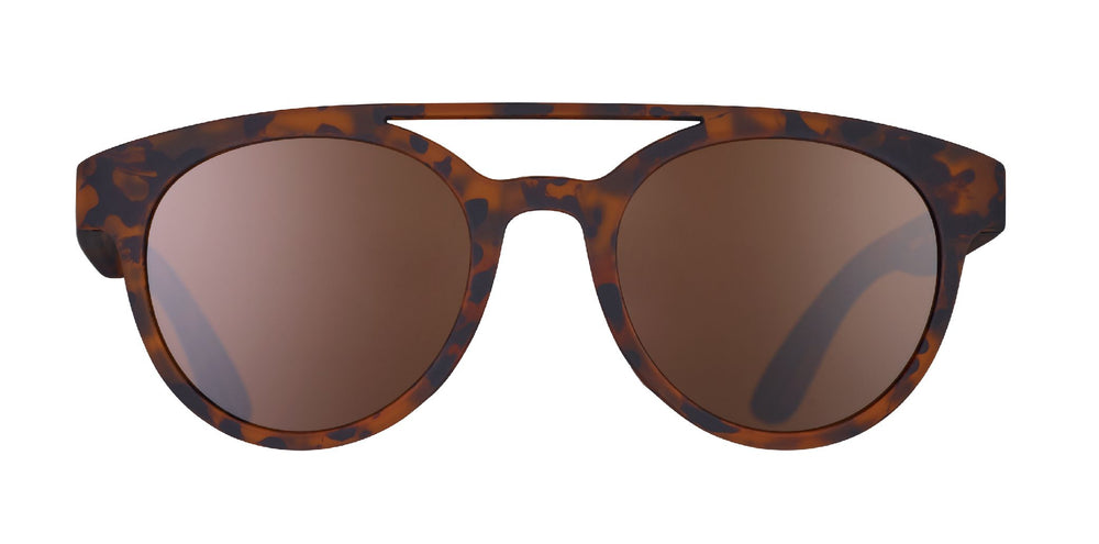 goodr PHG polarized sunglasses ARTIFACTS, NOT ARTIFEELINGS model with tortoise shell frame, no slip no bounce fit, and polarized lenses offering stylish protection for active lifestyles