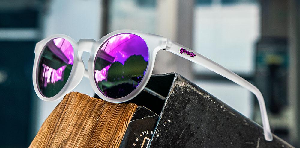 Circle G running sunglasses Strange Things Are Afoot At The Circle G model with white frame and purple round polarized lenses, no slip no bounce fit for comfortable running and outdoor use