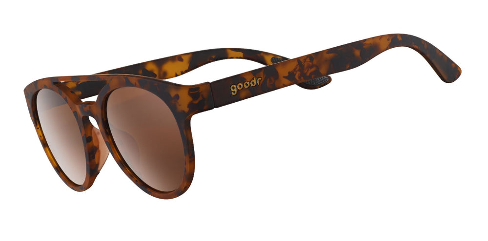 goodr PHG polarized sunglasses ARTIFACTS, NOT ARTIFEELINGS model with tortoise shell frame, no slip no bounce fit, and polarized lenses offering stylish protection for active lifestyles