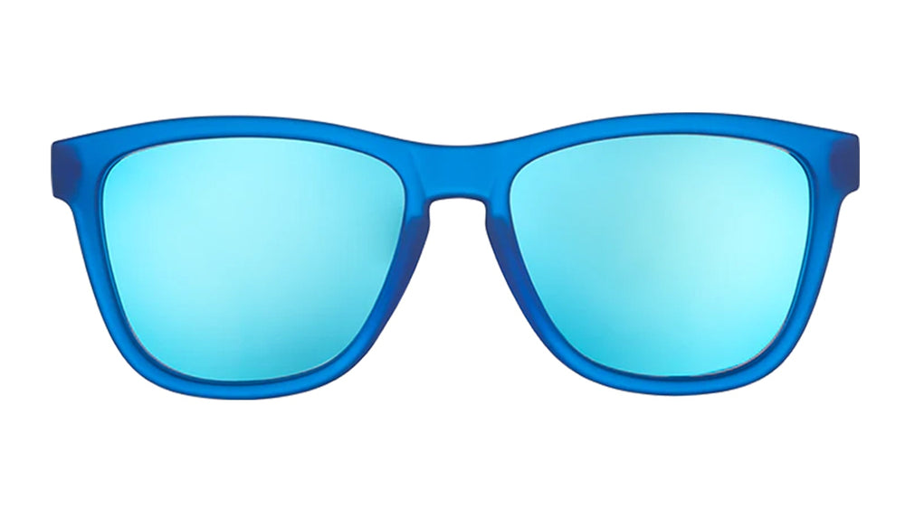 Goodr Falkor's Fever Dream OG running sunglasses with vibrant blue frame and blue polarized UV400 lenses — no-slip, no-bounce performance for running and outdoor activities.